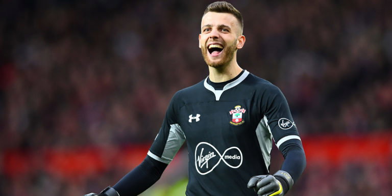 Angus Gunn salutes Hojbjerg following crucial Brighton win